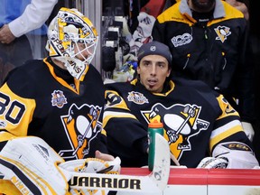 Pittsburgh Penguins goalie Matt Murray talks with goalie Marc-Andre Fleury in a break during the third period against the Ottawa Senators in Game 5 of the Eastern Conference Final on May 21, 2017. (AP Photo/Gene J.Puskar)