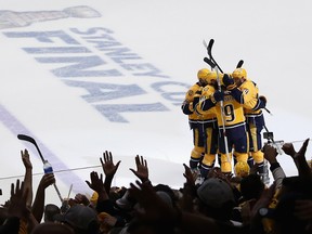 Filip Forsberg of the Nashville Predators celebrates with his teammates after scoring a goal against the Pittsburgh Penguins during the third period in Game 4 of the Stanley Cup Final at the Bridgestone Arena on June 5, 2017. (Patrick Smith/Getty Images)