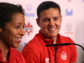 Winnipeg's Desiree Scott (left) of the Canadian women's soccer team answers a question with teammate Christine Sinclair looking on during a press conference at Investors Group Field in Winnipeg on Tues., June 6, 2017. Canada hosts Costa Rica in an international friendly on June 8. Kevin King/Winnipeg Sun/Postmedia Network