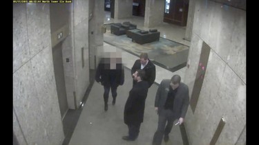 The complainant (face blurred) in a frame grab from a Crown exhibit surveillance video recorded in the early hours of the night of the alleged sexual assault on Jan. 17, 2015 at the Westin Harbour Castle. Person on the right is a random passerby.