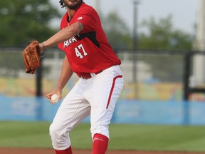 Phillipe Aumont, seen here pitching for Team Canada at the 2015 Pan Am Games, has signed a deal to pitch for the Champions. (Veronica Henri/Postmedia Network)