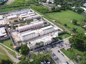This photo released by the Tamaulipas state security spokesperson’s office via Twitter and taken from a federal police helicopter shows the “Cedes” prison where authorities say three police were killed in Ciudad Victoria, Mexico, Tuesday, June 6, 2017. (Tamaulipas state security spokesperson’s office via AP)