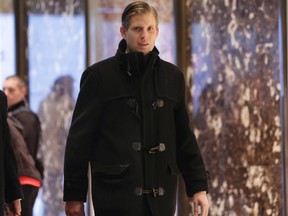 Eric Trump. son of President-elect Donald Trump, arrives in Trump Tower in New York, Friday, Dec. 16, 2016. (AP Photo/Richard Drew)