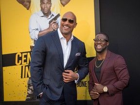 Actors Dwayne Johnson and Kevin Hart attend the premiere of Warner Bros. Pictures' "Central Intelligence" at Westwood Village Theatre on June 10, 2016 in Westwood, California. (Photo by Jason Kempin/Getty Images)