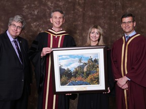 Chris Sheridan, left, son of Dr. Fred Sheridan, Bill Best, president of Cambrian College; Kathy Wells-McNeil, recipient of the Dr. Fred Sheridan Award recipient, and David McNeil, chair of Cambrian College board of governors. Supplied photo