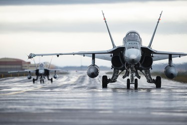 Two CF-188 Hornet fighters return from patrolling Iceland’s airspace during Operation REASSURANCE in Keflavik, Iceland, May 19, 2017.

Photo: Corporal Gary Calvé, Imagery Technician ATF-Iceland
