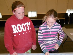 Grace Hallahan and Megan Todd are seen here enjoying playing the, '4-H Bread Game.'