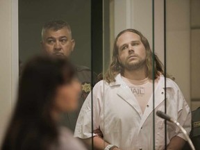 Jeremy Christian enters for a court appearance at Multnomah County Circuit Court in Portland, Ore., on Wednesday, June 7, 2017. Christian is accused of killing two passengers and wounding a third aboard a light-rail train. (Stephanie Yao Long/The Oregonian via AP/Pool)