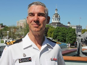 Lt.-Comdr. Robert Tucker, the commanding officer of HMCS Goose Bay, on the ship at Crawford Wharf in Kingston on Wednesday. The ship stopped in Kingston as part of its Great Lakes deployment. (Steph Crosier/The Whig-Standard)