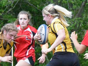 Taryn McLachlan lugs the ball at the recent OFSAA AA girls rugby championships in Durham Region. (Catherine Frost for The Intelligencer)