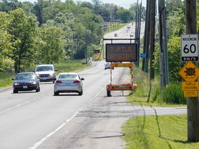 The City of Kingston has erected two solar signs along Highway 2, between Collins Bay Road and Westbrook, to caution drivers to keep an eye out for turtles crossing the road. (Julia McKay/The Whig-Standard)