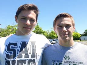 Tyson Fletcher, left, and Connor Quinton, both students at Holy Cross Catholic Secondary School and members of the Kingston Wrestling Club, will travel to Japan in July for a training and competition wrestling event.