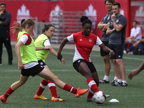 Deanne Rose (right) dribbles the ball under pressure from Janine Beckie (left) and Allysha Chapman during national women's soccer team training at Investors Group Field in Winnipeg on Wed., June 7, 2017. Canada faces Costa Rica in an international friendly on Thursday. Kevin King/Winnipeg Sun/Postmedia Network