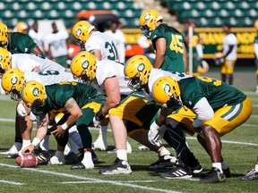 The offensive line is pictured during Edmonton Eskimos training camp at Commonwealth Stadium in Edmonton on Monday, May 29, 2017.