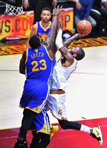 Kyrie Irving #2 of the Cleveland Cavaliers drives to the basket against Draymond Green #23 of the Golden State Warriors in the first half in Game 3 of the 2017 NBA Finals at Quicken Loans Arena on June 7, 2017 in Cleveland, Ohio. (Photo by Jason Miller/Getty Images)