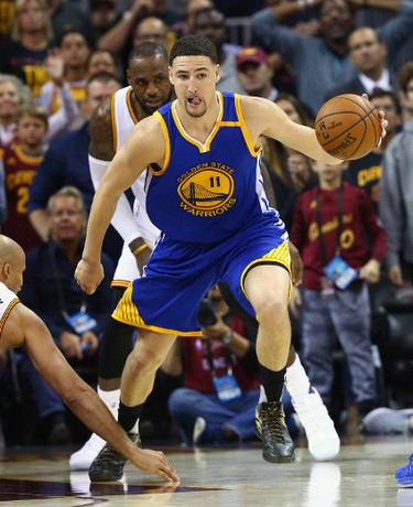 Klay Thompson #11 of the Golden State Warriors handles the ball on offense against the Cleveland Cavaliers during the first half of Game 3 of the 2017 NBA Finals at Quicken Loans Arena on June 7, 2017 in Cleveland, Ohio. (Photo by Ronald Martinez/Getty Images)