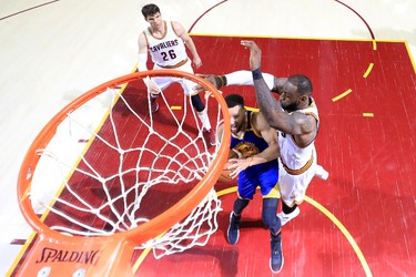 LeBron James #23 of the Cleveland Cavaliers defends Stephen Curry #30 of the Golden State Warriors in the second half in Game 3 of the 2017 NBA Finals at Quicken Loans Arena on June 7, 2017 in Cleveland, Ohio. (Photo by Ronald Martinez/Getty Images)