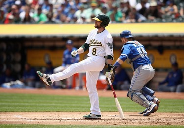 Jed Lowrie #8 of the Oakland Athletics reacts after striking out in the first inning against the Toronto Blue Jays at Oakland Alameda Coliseum on June 7, 2017 in Oakland, California.  (Photo by Ezra Shaw/Getty Images)