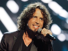 FILE - In this Sept. 5, 2008, file photo, musician Chris Cornell performs on stage during Conde Nast's Fashion Rocks show in New York. (AP Photo/Jeff Christensen, File)