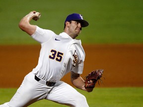 LSU pitcher Alex Lange throws in the first inning of an NCAA college tournament regional game against Southeastern Louisiana in Baton Rouge, La., on June 3, 2017. (AP Photo/Gerald Herbert)