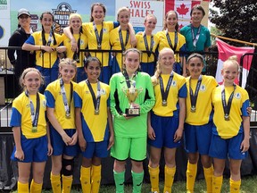 The Sarnia Under-13 Spirit won gold medals at the Ancaster Heritage Days soccer tournament by beating Flamborough Dundas West 3-1 in the championship game last Sunday. The team members are, front row, left:  Emily Kzyonsek, Madison Tuer, Arianna Satram, Ryann Turner, Ainsley Mackenzie, Adriana Netskos and Savanah VanHooft. Back row: manager Susie Sioutis, Gemma Hazzard, Paige Vidler, Ali McLellan, Avah Tsaprailis, Sophia Kember, Tala Snauwaert and coach Kevin Simmonds. Lulu Owen is absent. (Contributed Photo)