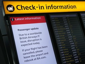 A displays warning passengers to "Expect Disruption" to British Airways flights, is pictured inside Terminal 5 of London's Heathrow Airport on May 29, 2017.
Passengers faced a third day of disruption at Heathrow Monday as British Airways cancelled short-haul flights after a global computer crash that unions blamed on the outsourcing of IT services to India. The embattled airline said it was cancelling 13 short-haul flights from Heathrow Airport, Europe's busiest, but was aiming to operate a full long-haul schedule from the hub and was operating a full service from Gatwick Airport. (AFP/Getty Images)