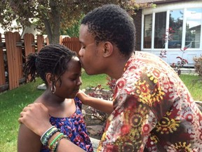 A crowd-funding page set up Wednesday said 11-year-old Christina Mawusi died after a fire at her home in Edmonton's Lago Lindo neighbourhood. Sixteen-year-old Ethan Peters, identified as her brother, was in critical care as of Wednesday.