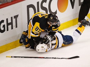 Sidney Crosby of the Pittsburgh Penguins falls on top of P.K. Subban of the Nashville Predators during Game 5 of the Stanley Cup Final at PPG Paints Arena on June 8, 2017. (Gregory Shamus/Getty Images)