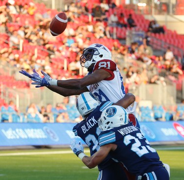 Toronto Argonauts Matt Black DB (39) causes the fumble just before the end zone with Montreal Alouettes Devon Bailey WR (81) in the first quarter during pre-season CFL action in Toronto, Ont. on Thursday June 8, 2017. Jack Boland/Toronto Sun/Postmedia Network