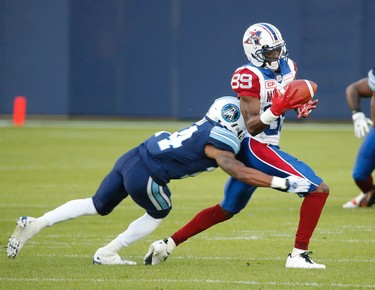 Toronto Argonauts Qudarius Ford DB (14) chases down Montreal Alouettes TJ Graham WR (89) and causes the no catch the second quarter during pre-season CFL action in Toronto, Ont. on Thursday June 8, 2017. Jack Boland/Toronto Sun/Postmedia Network