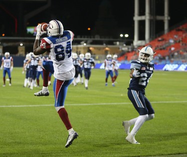 Montreal Alouettes George Johnson WR (84) hauls in a TD grab with under two minutes left  in the fourth quarter during pre-season CFL action in Toronto, Ont. on Friday June 9, 2017. Jack Boland/Toronto Sun/Postmedia Network