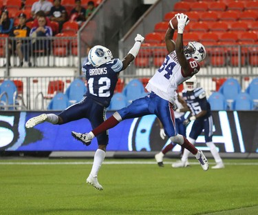 Montreal Alouettes George Johnson WR (84) grabs a two-point convert - with under two minutes -   in the fourth quarter during pre-season CFL action in Toronto, Ont. on Friday June 9, 2017. Jack Boland/Toronto Sun/Postmedia Network