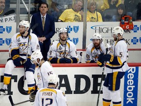 Predators coach Peter Laviolette and players pause at the bench during the third period against the Penguins in Game 5 of the Stanley Cup final in Pittsburgh on Thursday, June 8, 2017. (Gene J. Puskar/AP Photo)
