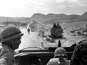 Associated Press file photo
In this June 7, 1967, photo, Israeli troops advance through Sinai, Egypt during the Six-Day War. It may well be remembered as a pyrrhic victory for Israel: a six-day war in which it vanquished several Arab armies, only to be saddled with a 50-year fight with the Palestinians for the Holy Land. A half-century after the watershed 1967 Mideast war, many in Israel believe the lightning victory planted the seeds of doom.