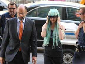 Amanda Bynes attends an appearance at Manhattan Criminal Court on July 9, 2013 in New York City. Bynes is facing charges of reckless endangerment, tampering with evidence and criminal possession of marijuana in relation to her arrest on May 23, 2013. (Photo by Neilson Barnard/Getty Images)
