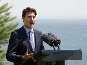 Prime Minister Justin Trudeau responds to reporters questions at a news conference at the Manoir Richelieu, overlooking the St.Lawrence river, Thursday, June 8, 2017 in La Malbaie Quebec. (THE CANADIAN PRESS/Jacques Boissinot)