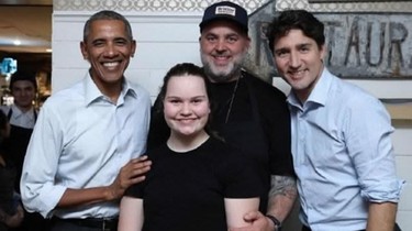 Mystery man appears in photo of Canadian Prime Minister Justin Trudeau and former U.S. president Barack Obama as they pose with Liverpool House owner David Hayfield McMillan and his daughter Dylan. (twitter photo)