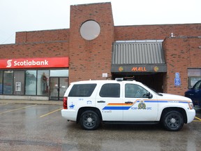 An RCMP vehicle parked outside the Whitecourt Scotiabank at Midtown Mall, where an armed robbery occurred on June 9 (Peter Shokeir | Whitecourt Star).