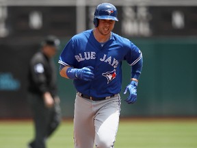 Justin Smoak of the Toronto Blue Jays rounds the bases after hitting a home run in the second inning against the Oakland Athletics at Oakland Alameda Coliseum on June 7, 2017. (Ezra Shaw/Getty Images)