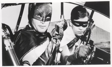 Adam West, left, as Batman and Burt Ward as Robin in the "Batman" television series. (Supplied/File Photo)