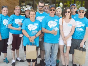 Dawn Butler’s family and friends came out to remember her last Saturday morning, including (from left) Bonnie Butler, Bev Dama, Pam Hyatt, Derek Butler, Joe Dama, Carl Butler, Mary Thibert, Amanda Wilson, Jerry Thibert, and Tom Wilson. Together they raised $1,500 for the Alzheimer’s Society in Chatham-Kent.