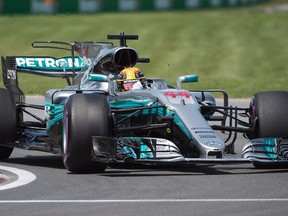 Mercedes driver Lewis Hamilton takes a turn at the Senna corner during qualification at the Canadian Grand Prix in Montreal on Saturday, June 10, 2017. (Graham Hughes/The Canadian Press)