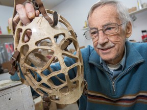 Bob Kelly with the goaltending mask he purchased in the 1960s.