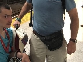 Ronald Heal and his son Cameron, 34, who was born with cerebral palsy, had to overcome a closure on the TTC's Bloor-Danforth Line in order to spend time together this weekend. (Joe Warmington/Toronto Sun)
