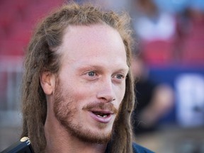 Argonauts' Bear Woods speaks to the media before his team plays the Alouettes in CFL pre-season action in Toronto on Thursday, June 8, 2017. (Mark Blinch/The Canadian Press)