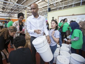 Canada's Minister of Immigration, Refugees and Citizenship, Ahmed D. Hussen joins volunteers with the IDRF, GlobalMedic and the Canadian Somali Congress as they prepare family emergency kits to support families in Somalia at the The Learning Enrichment Foundation in Toronto, Ont. on Saturday June 10, 2017. (Ernest Doroszuk/Toronto Sun)