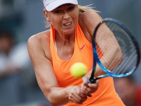 Maria Sharapova will miss the grass-court season, which includes Wimbledon. (Francisco Seco/AP Photo/Files)