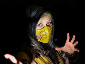 Professional cosplayer Marie-Claude Bourbonnais shows off her Mortal Kombat Scorpion costume at this year's Original Quinte ToyCon on Sunday June 11, 2017 in Belleville, Ont. Bourbonnais was a special guest at the annual toy-centric convention. Tim Miller/Belleville Intelligencer/Postmedia Network
