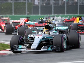 Mercedes driver Lewis Hamilton (44) leads the pack at the start of the Canadian Grand Prix Sunday, June 11, 2017 in Montreal. (THE CANADIAN PRESS/Tom Boland)