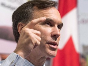 Federal Finance Minister Bill Morneau speaks to students at Concordia University, Tuesday, May 23, 2017 in Montreal. Finance Minister Bill Morneau is to meet with his American counterpart in Ottawa next week.Morneau says he looks forward to the June 9 meeting with Treasury Secretary Steven Mnuchin. (THE CANADIAN PRESS/Ryan Remiorz )